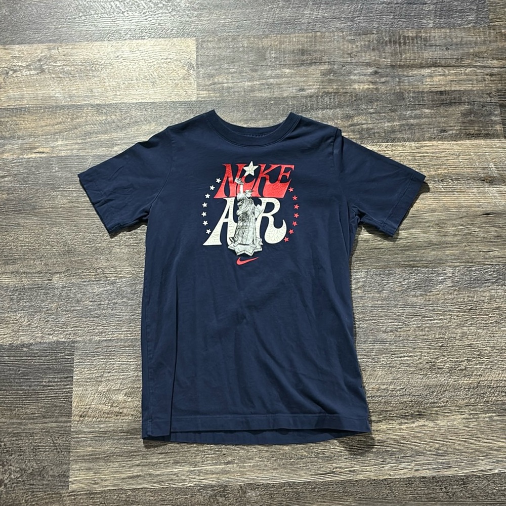 Blue Nike shirt kids large